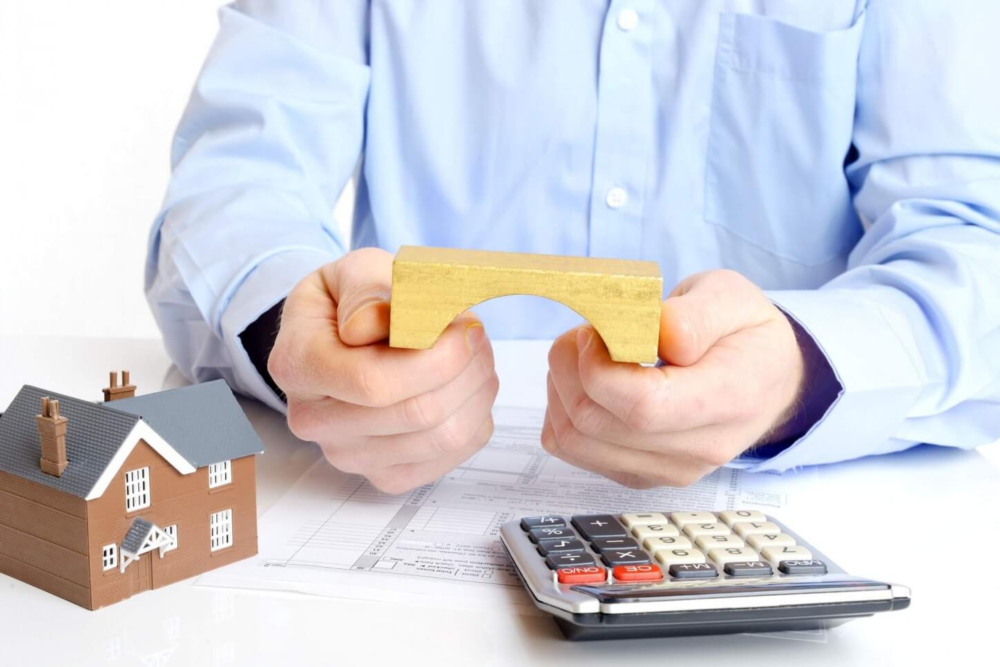 Bridge Financing with Bad Credit: How to Buy a House Before Yours Sells